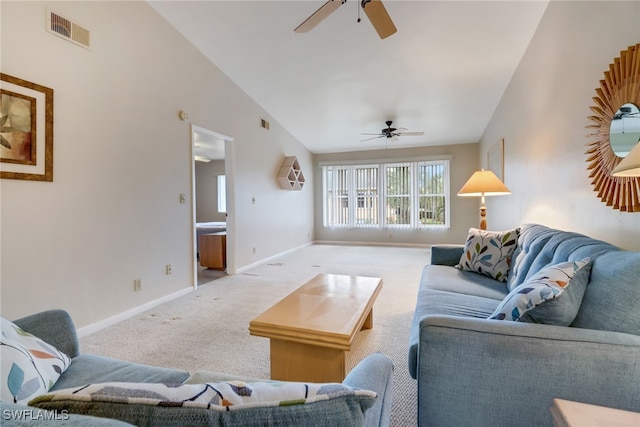 carpeted living room featuring ceiling fan and vaulted ceiling