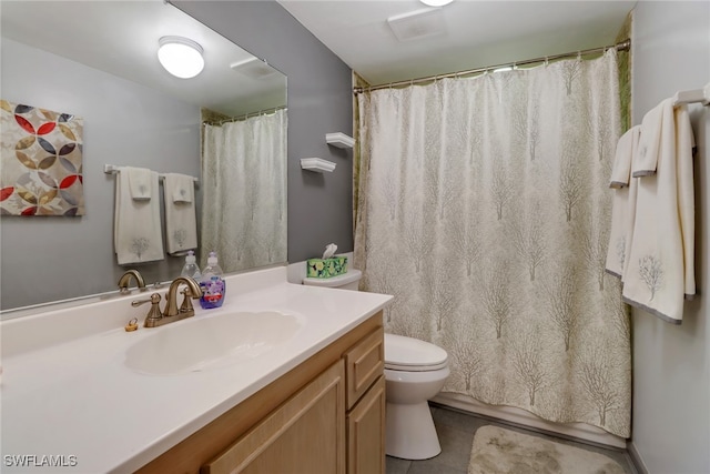 bathroom with walk in shower, tile patterned flooring, vanity, and toilet