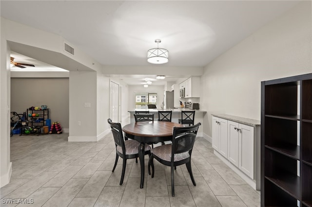 dining area with ceiling fan