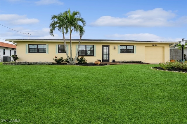 single story home featuring a garage, central AC unit, and a front yard