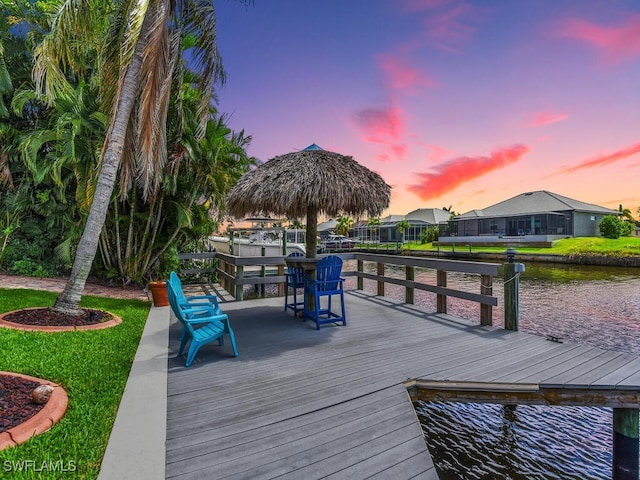 exterior space featuring a water view and a gazebo