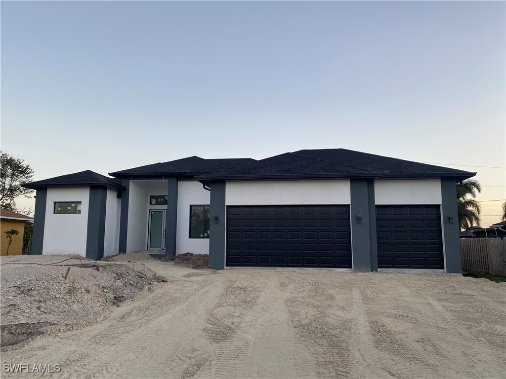 prairie-style home with a garage