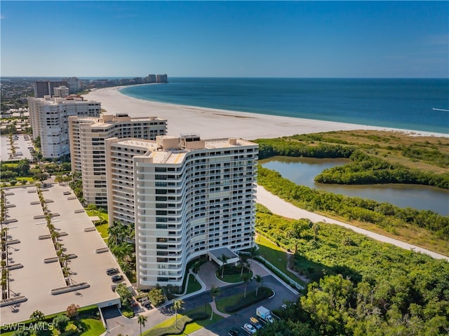 bird's eye view with a beach view and a water view