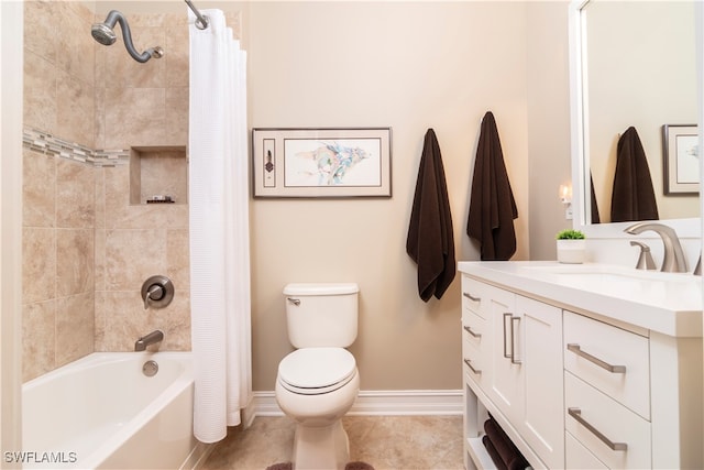 full bathroom with tile patterned floors, vanity, shower / tub combo, and toilet