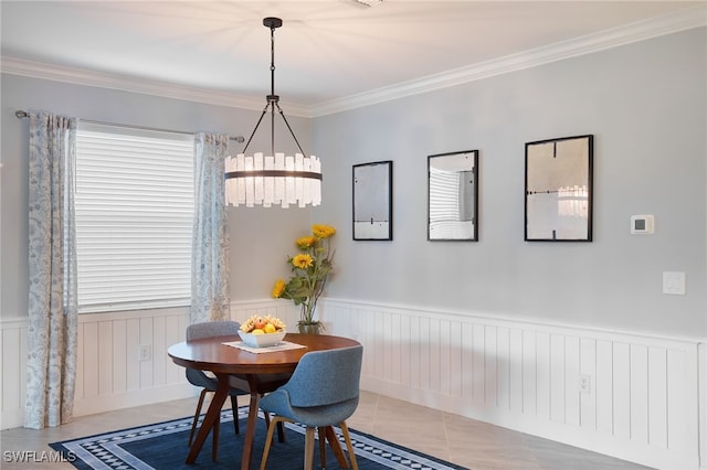 tiled dining room with ornamental molding