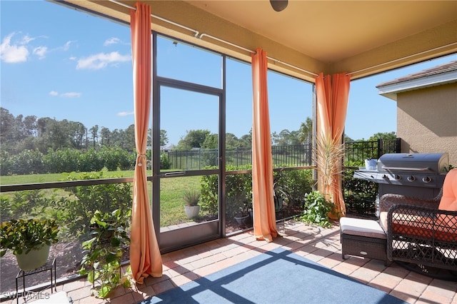 sunroom / solarium featuring plenty of natural light