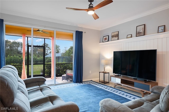 living room featuring ceiling fan, hardwood / wood-style floors, and ornamental molding