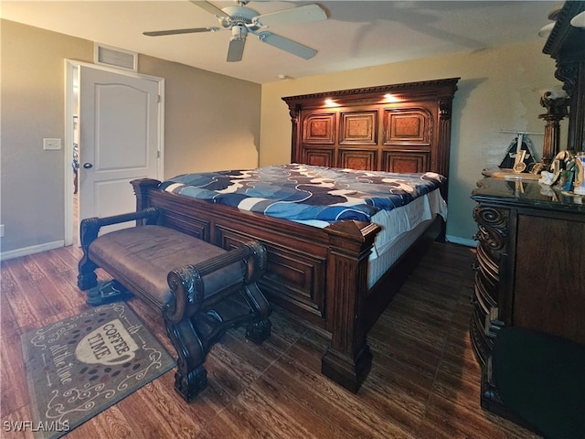 bedroom featuring dark wood-type flooring and ceiling fan