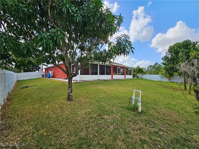 view of yard with a sunroom