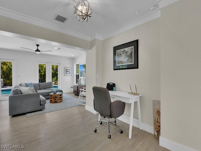 office featuring a notable chandelier, ornamental molding, and light hardwood / wood-style floors