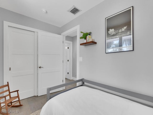 bedroom featuring light wood-type flooring