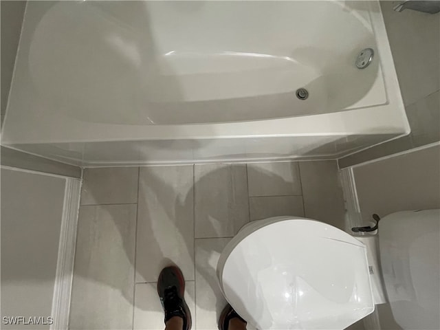 bathroom featuring toilet