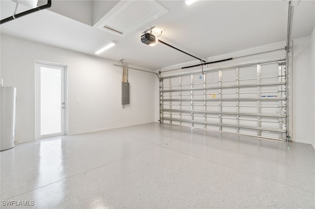 garage featuring electric panel and water heater