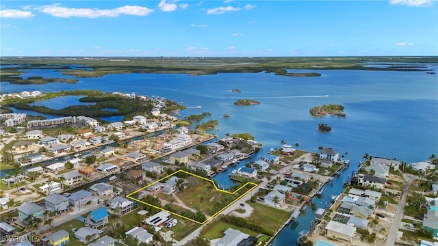 aerial view with a residential view and a water view