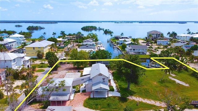 aerial view featuring a water view and a residential view