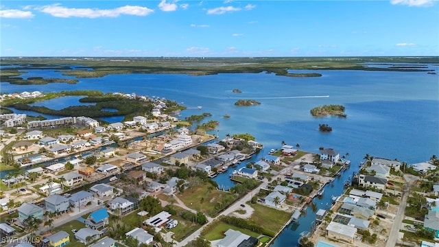 aerial view featuring a water view and a residential view