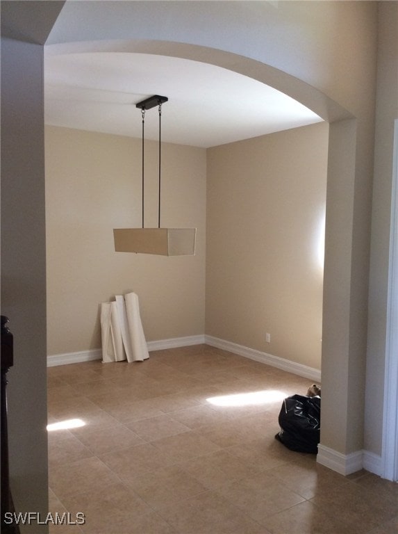 view of tiled spare room