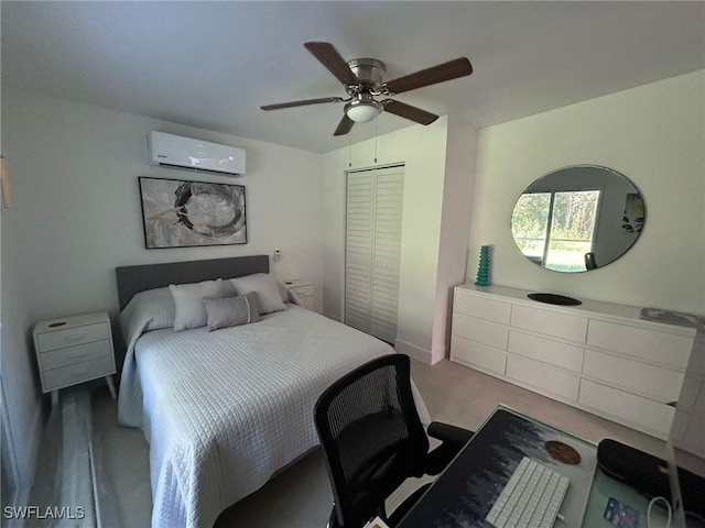 carpeted bedroom featuring a wall unit AC, a closet, and a ceiling fan