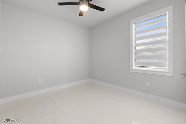 unfurnished room with ceiling fan