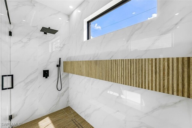 bathroom with an enclosed shower