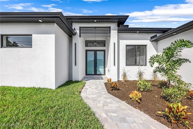 doorway to property with french doors