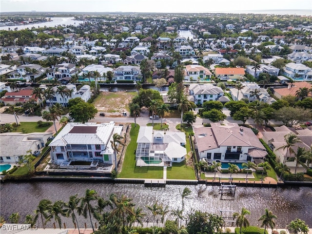 bird's eye view with a water view