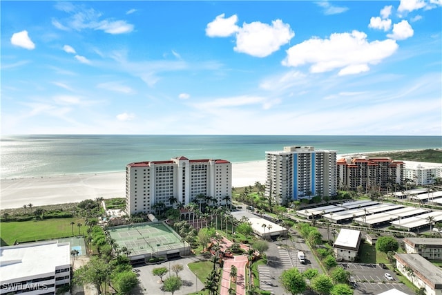 bird's eye view with a beach view and a water view