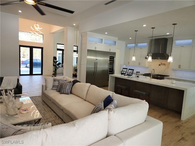 living room featuring hardwood / wood-style flooring and french doors