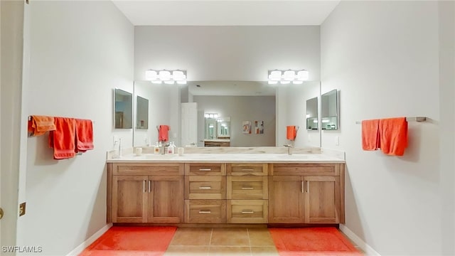 bathroom with vanity and tile patterned floors