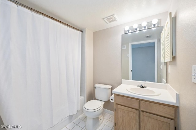 4625 Saint Croix Ln Unit 1132, Naples, FL 34109 - bathroom featuring vanity, tile patterned flooring, and shower / bathtub combination with curtain