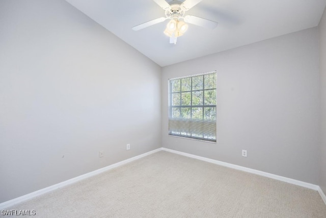 4625 Saint Croix Ln Unit 1132, Naples, FL 34109 - unfurnished room featuring light carpet, lofted ceiling, and ceiling fan