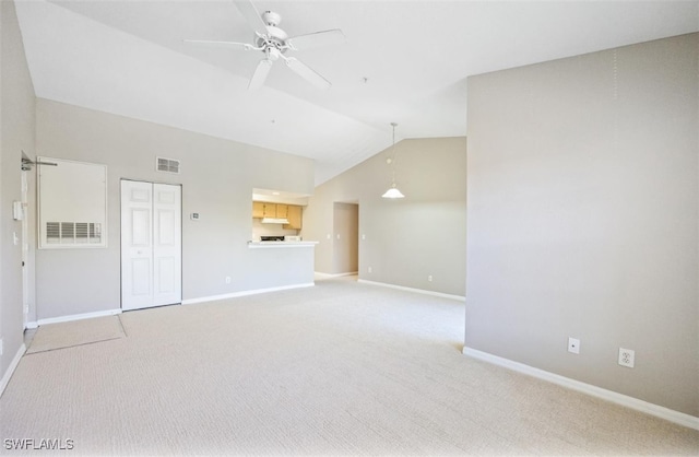 4625 Saint Croix Ln Unit 1132, Naples, FL 34109 - unfurnished living room featuring ceiling fan, lofted ceiling, and light colored carpet