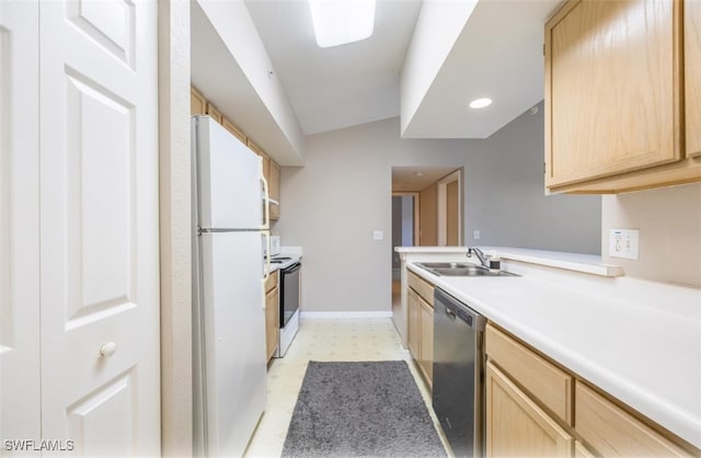 4625 Saint Croix Ln Unit 1132, Naples, FL 34109 - kitchen with white appliances, light brown cabinetry, light floors, light countertops, and recessed lighting