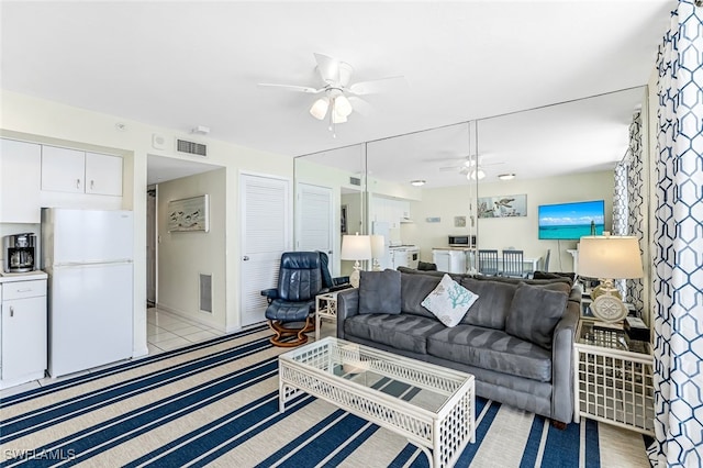 living room featuring ceiling fan