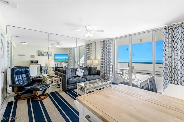 living room with ceiling fan