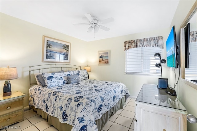 bedroom featuring ceiling fan and light tile patterned floors