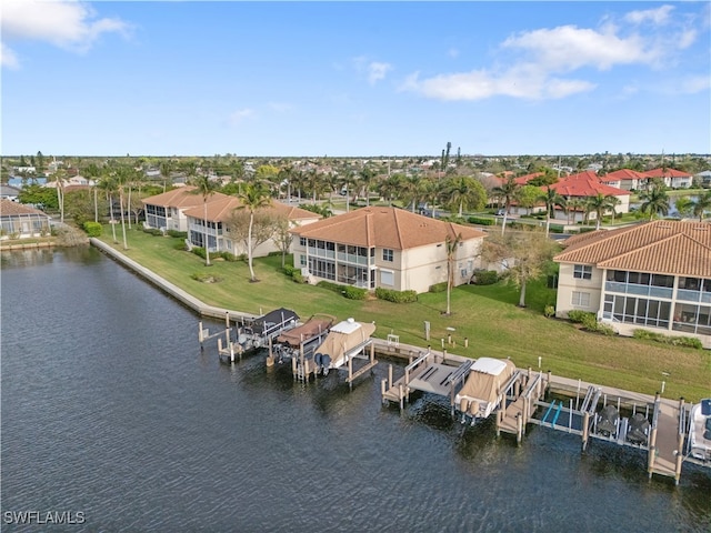 bird's eye view with a water view