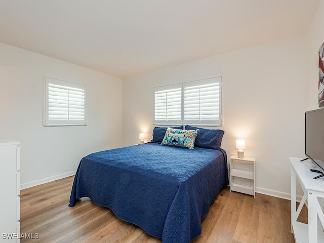 bedroom featuring light hardwood / wood-style floors