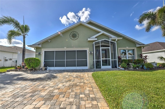 ranch-style home with a front lawn