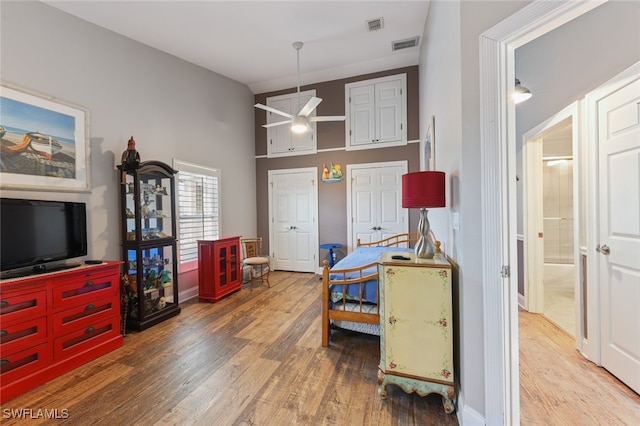 bedroom with wood-type flooring