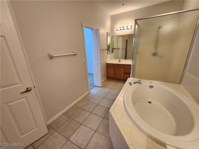 bathroom featuring separate shower and tub, vanity, and tile patterned floors