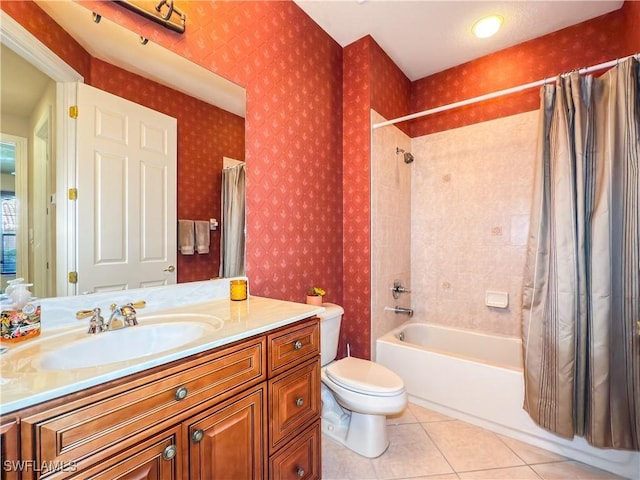 full bathroom with tile patterned flooring, shower / bath combo, vanity, and toilet