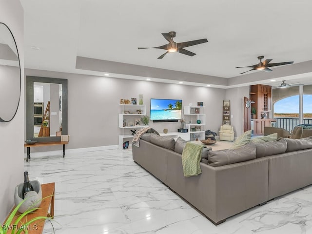 living room with ceiling fan