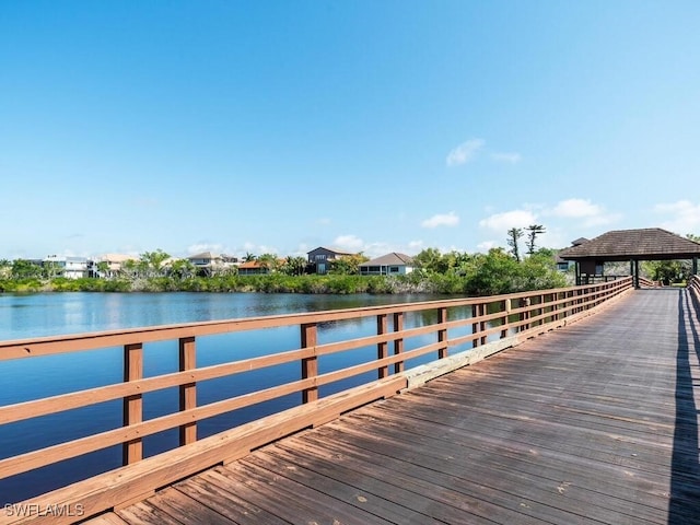 dock area with a water view