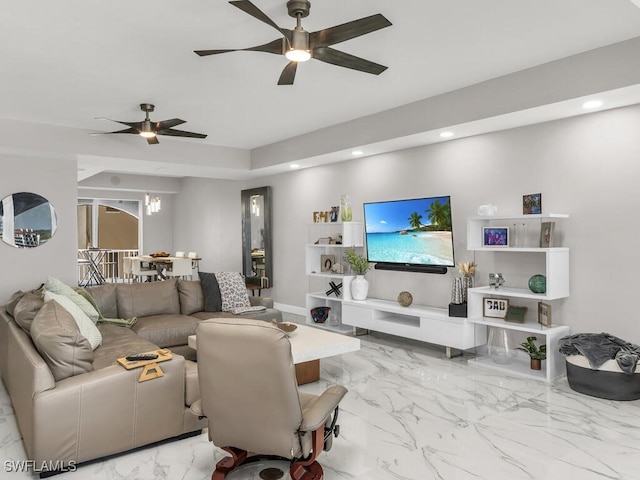 living room featuring ceiling fan