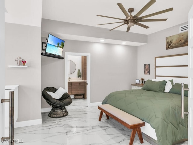 bedroom featuring ensuite bath and ceiling fan