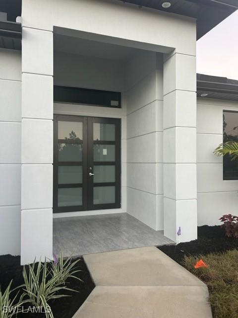 entrance to property with french doors