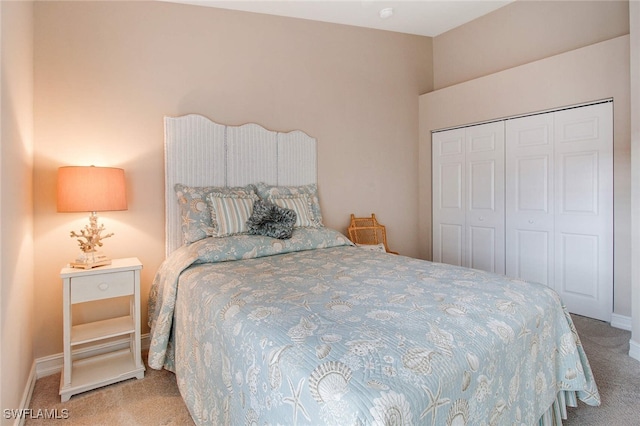 bedroom with carpet floors and a closet