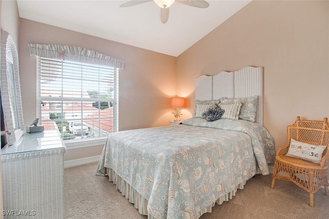 carpeted bedroom featuring ceiling fan and lofted ceiling