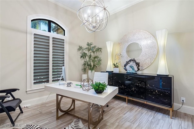 office featuring ornamental molding, a notable chandelier, and hardwood / wood-style floors